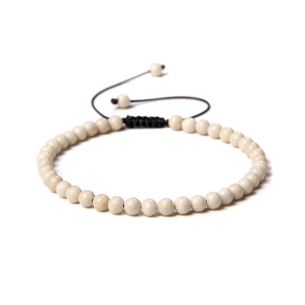 Fossile Blanc : Vertus, Bienfaits, Propriétés et Signification en Lithothérapie bracelet fossile blanc pierres boules 4mm cordon ajustable 01